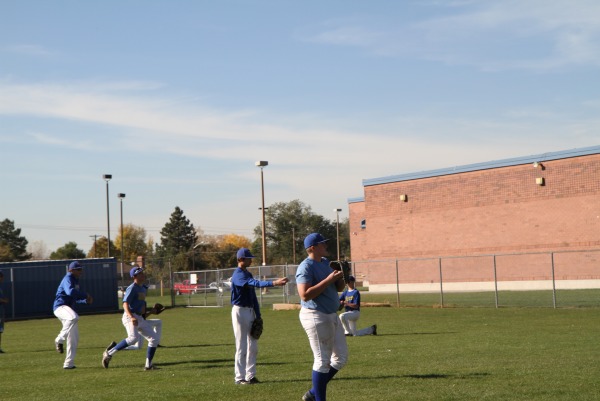 The baseball team participates in after school practice.