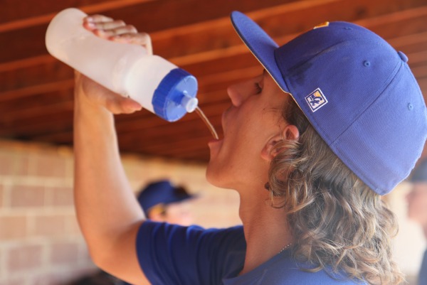Cole Fivecoat, junior, drinks water instead of soda, or other unhealthy drinks, to stay hydrated during baseball practice.