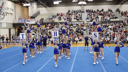 Cheerleaders take pride in their team