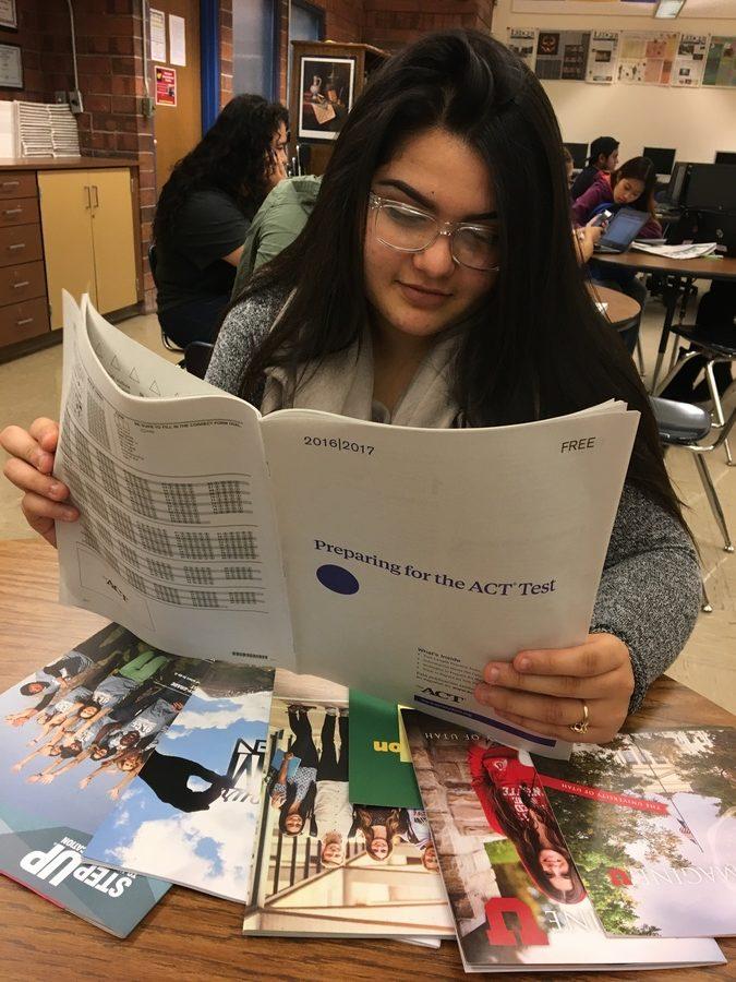 Senior Angelica Macias is flipping through the ACT study guide.