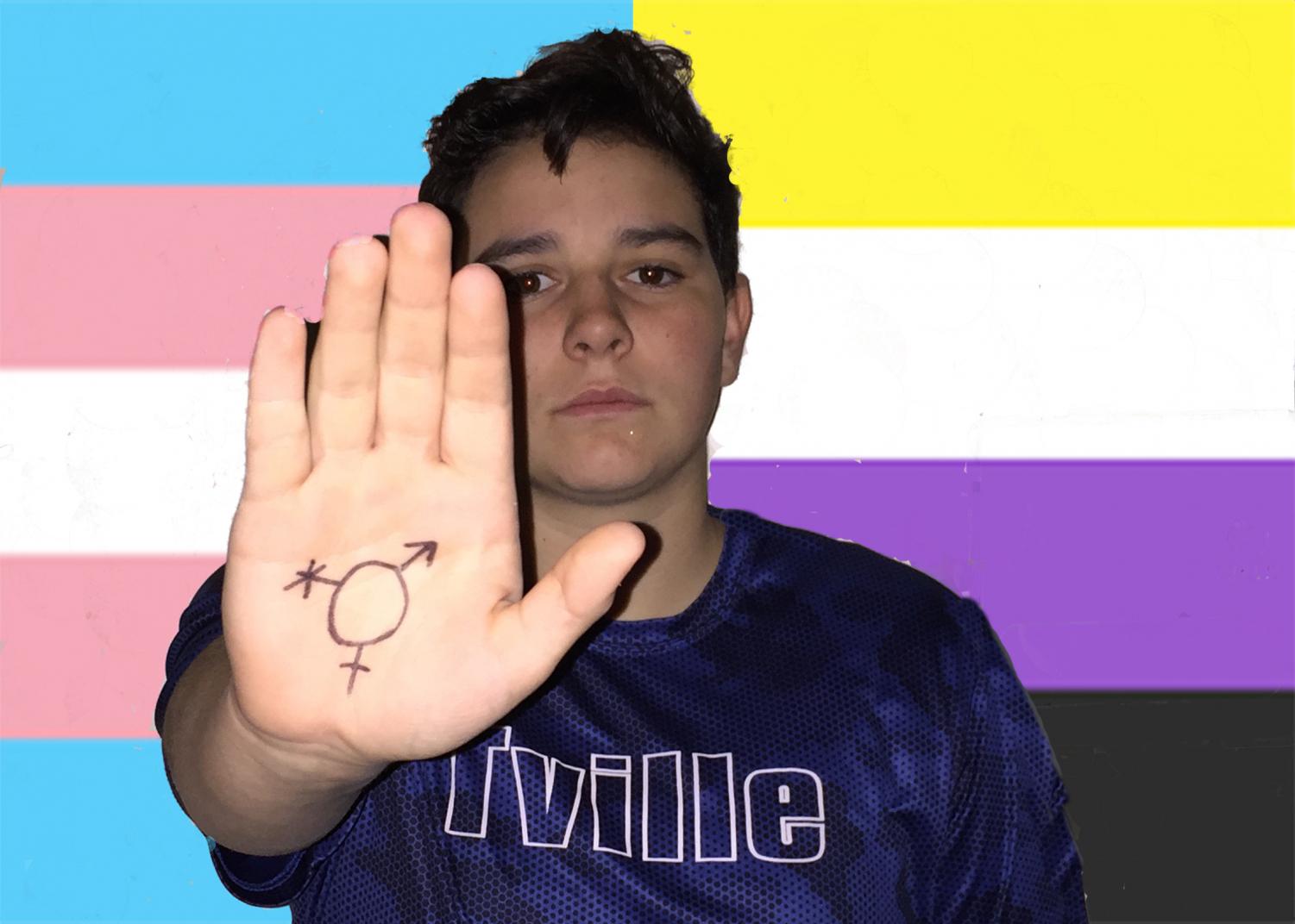 Non-binary Student Jordan Harvey poses with gender marker, indicative of how they don't fit within the 'standard' gender identities.