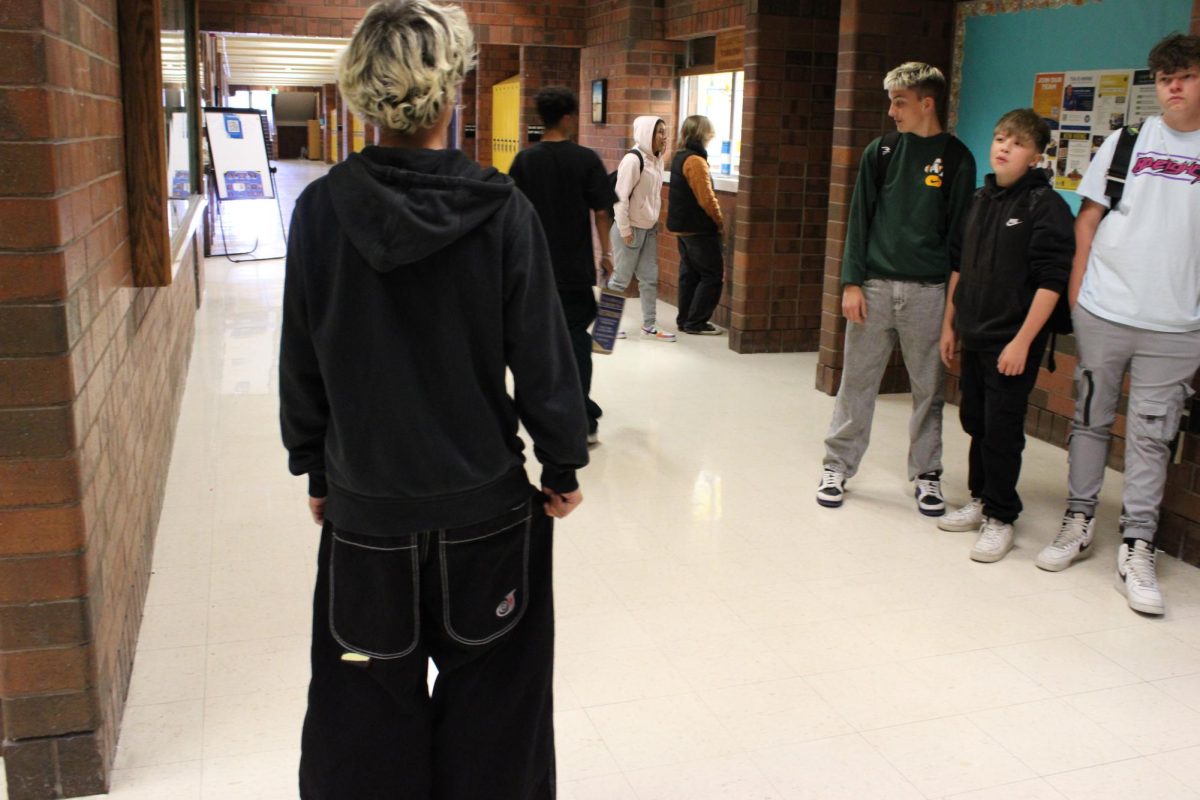 Student at Taylorsville High School is wearing the trendy 90's JNCO jeans in 2024.